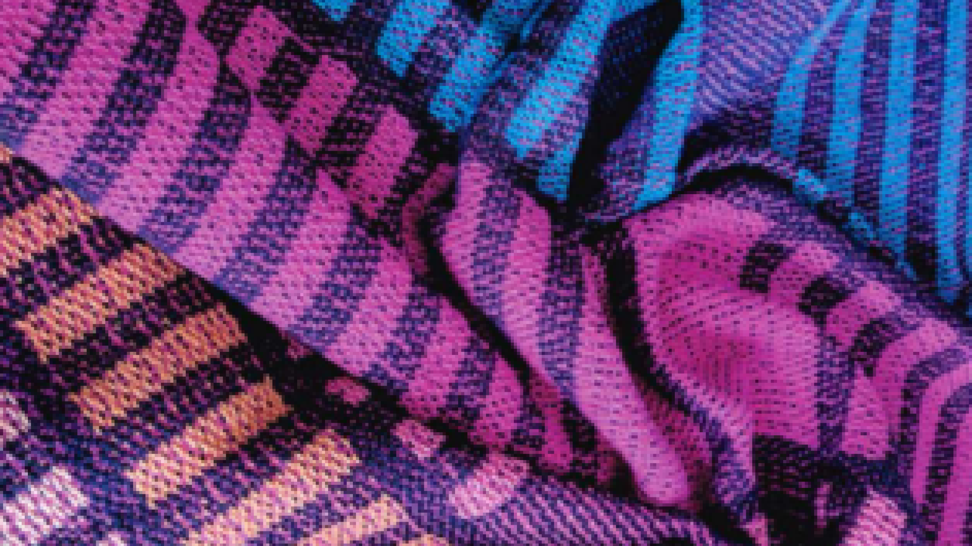 Multi-colour woven fabric with purple stripes. 
