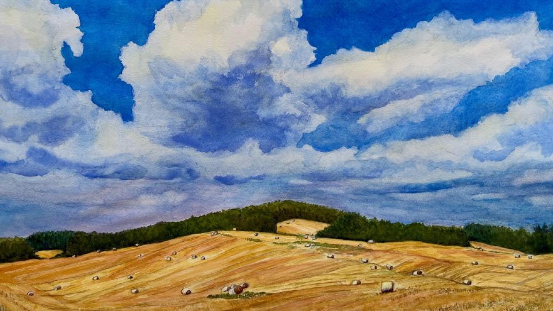 Detail view of watercolour painting "Golden Waves Beneath August Skies" by Carol Hughes, showing a hay bales in a field beneath a blue sky with white clouds.