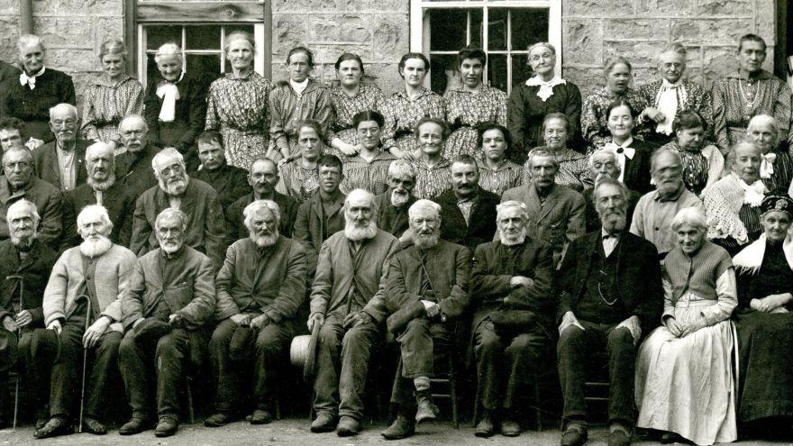 Group portrait of residents of the Wellington County Poor House, taken circa 1900.