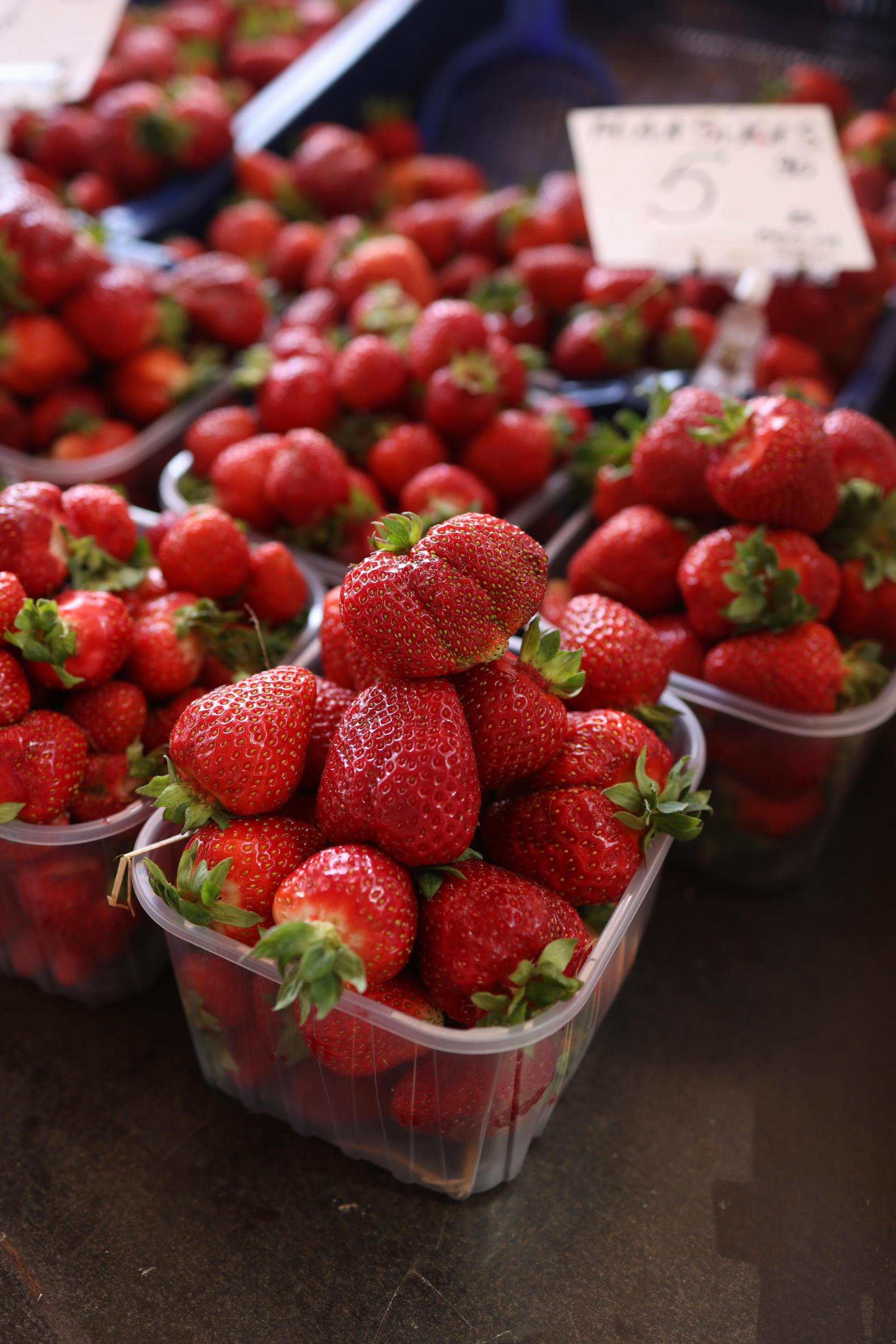 small baskets of strawberries